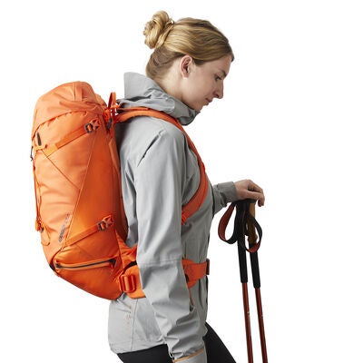 Alpinisto 28 LT in the color Zest Orange.